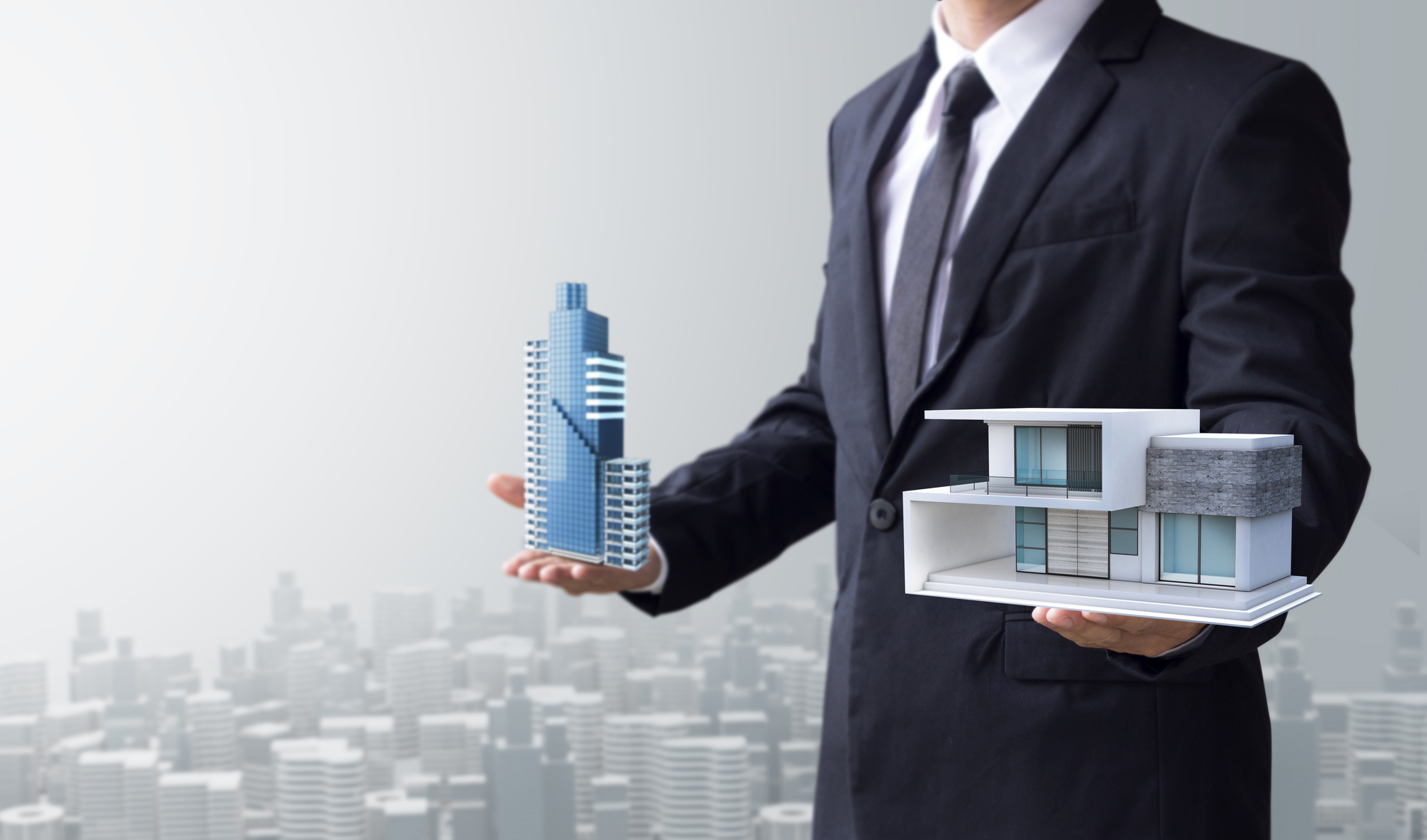 realtor holding model buildings