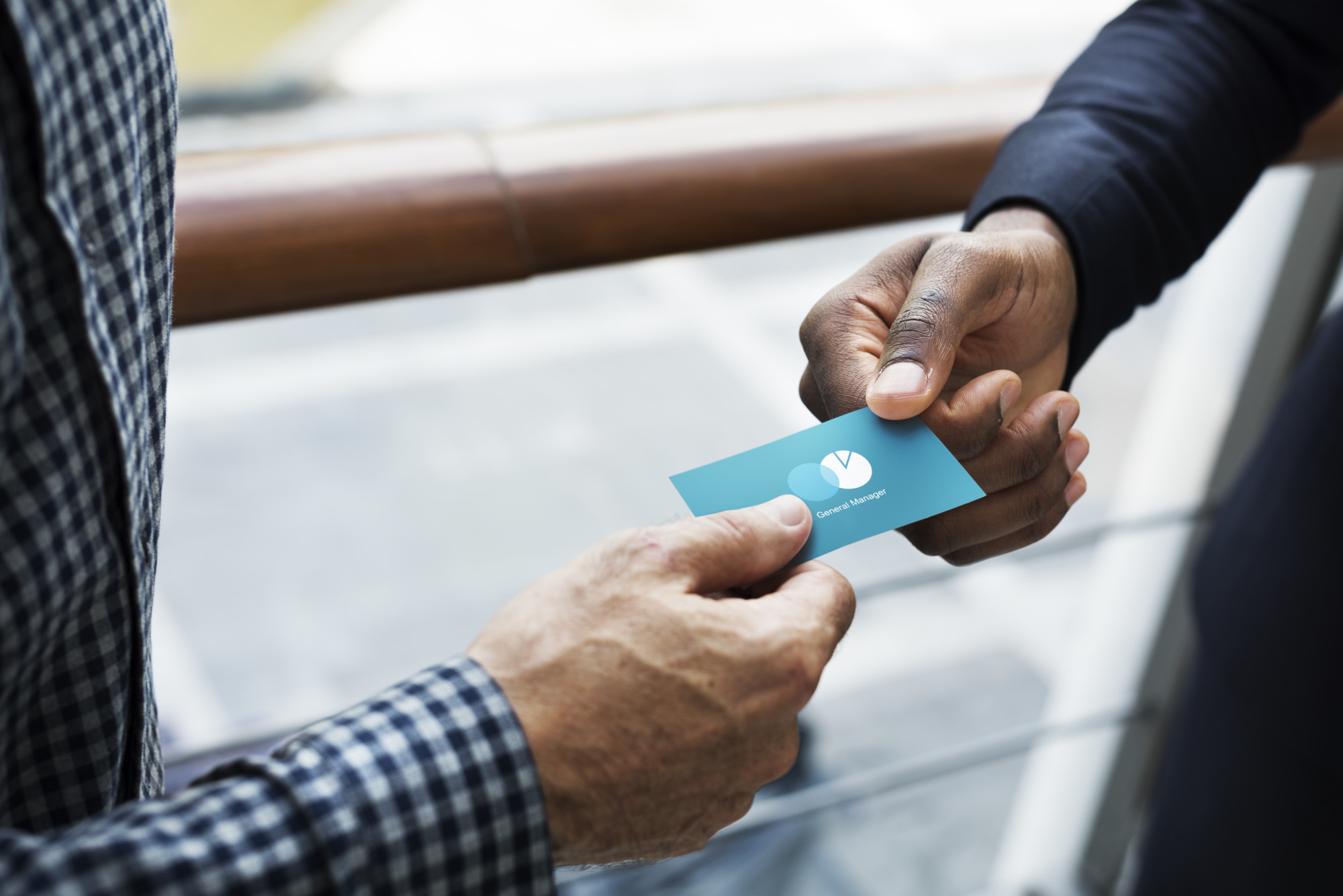 Person Handing a Business Card