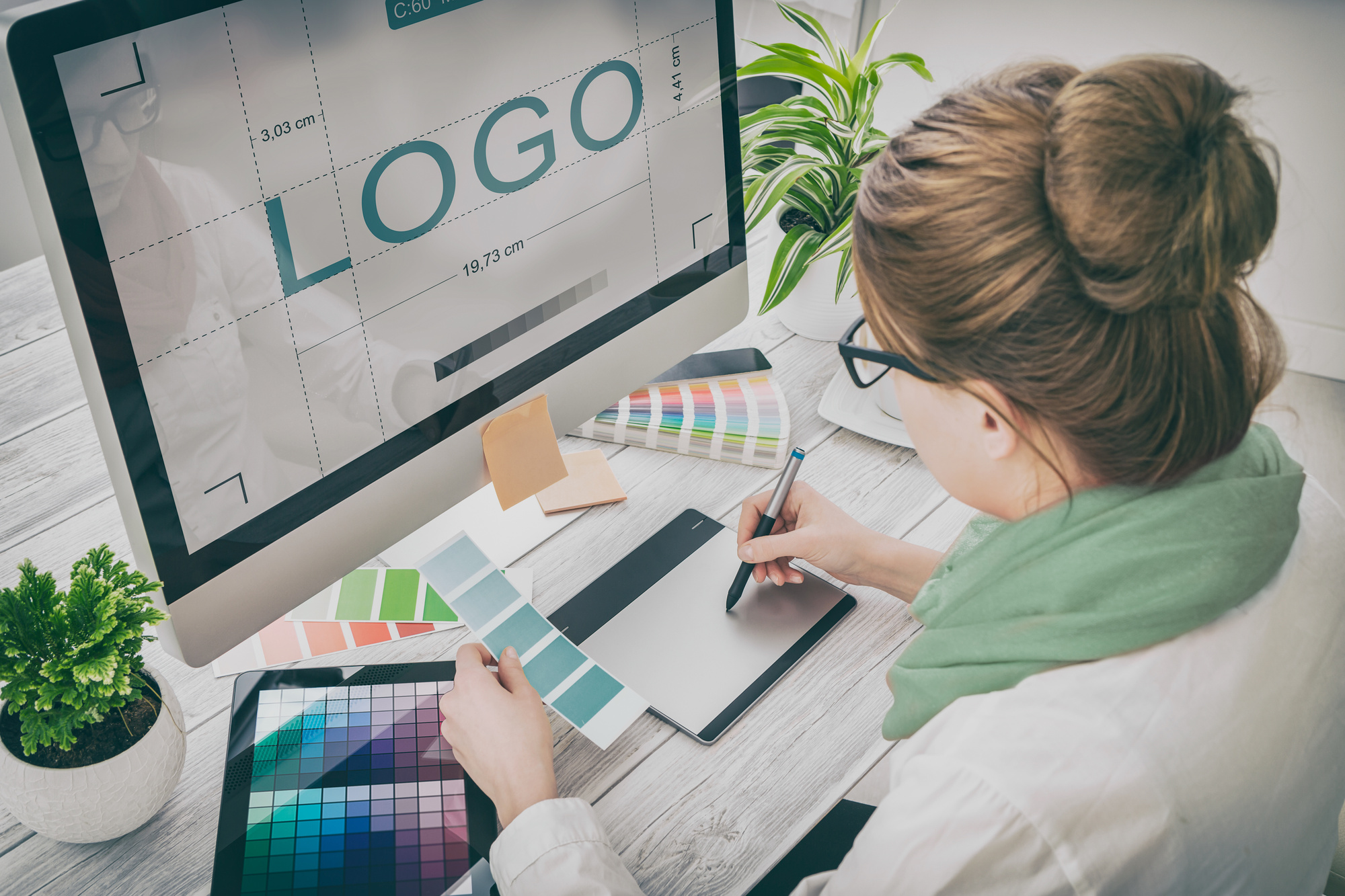 Woman Designing a Business Logo